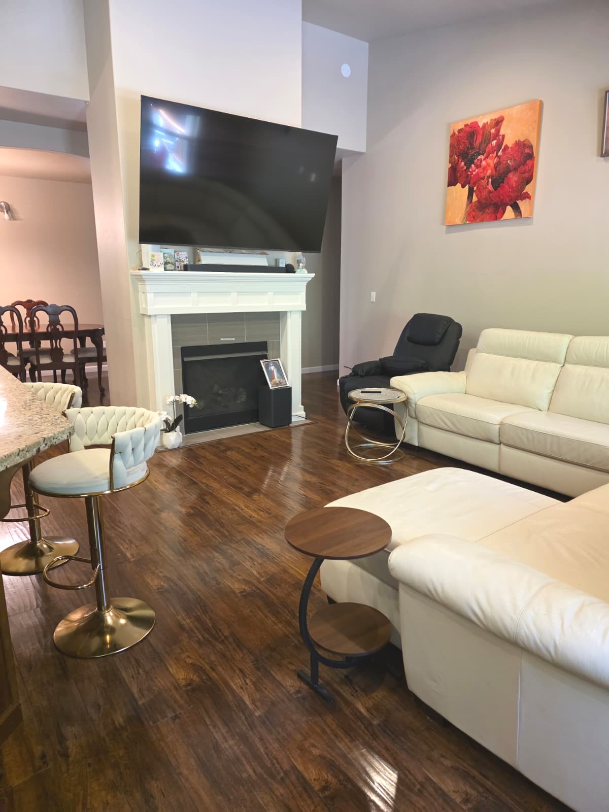 Warm living room with fireplace and comfortable seating at Adalena 2